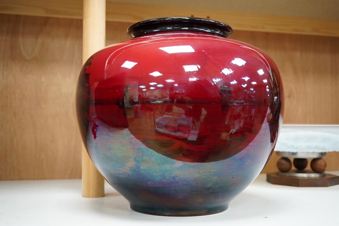 A large Doulton flambe vase decorated with ships, 29cm high